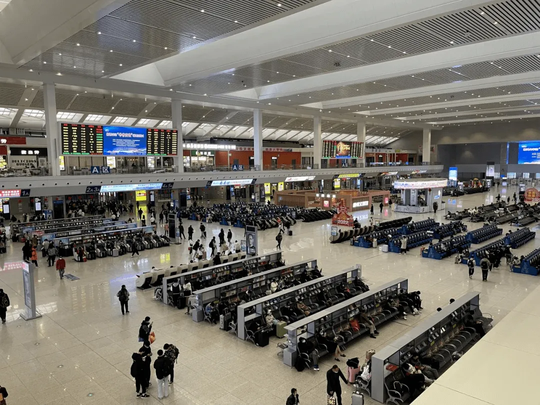 Waiting hall: match your train number to a check-in gate on the LED boards